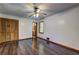 Charming bedroom with wood-look floors, built-in closet, and neutral color scheme at 3341 Rae Pl, Lawrenceville, GA 30044