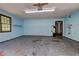 Garage featuring a single window and painted blue walls at 3341 Rae Pl, Lawrenceville, GA 30044