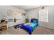 Bright bedroom featuring colorful decor and playful educational accents at 7492 Knoll Hollow Rd, Lithonia, GA 30058