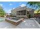 Relaxing backyard with luxurious pool, spa, and covered patio, perfect for outdoor entertaining at 2040 Parliament Dr, Lawrenceville, GA 30043