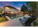 Expansive backyard with a pool, deck, screened porch, and lounge chairs at 2040 Parliament Dr, Lawrenceville, GA 30043
