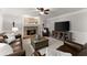Inviting living room featuring a brick fireplace, plush leather furniture, and stylish accents at 2040 Parliament Dr, Lawrenceville, GA 30043