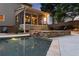 A home's screened porch and pool area provides a relaxing retreat and seamless indoor-outdoor living at 2040 Parliament Dr, Lawrenceville, GA 30043
