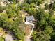 Bird's eye view of home with winding driveway and surrounding trees, providing a private setting at 2841 Bettis Ct, Marietta, GA 30066
