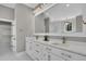 The bathroom features a double vanity with marble countertops and gold fixtures at 2841 Bettis Ct, Marietta, GA 30066
