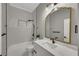 Bathroom with white cabinets and vanity, marble countertops and black hardware at 2841 Bettis Ct, Marietta, GA 30066