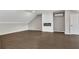 Expansive bonus room with hardwood floors, modern fireplace, and lots of natural light at 2841 Bettis Ct, Marietta, GA 30066