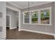 The dining room has modern light fixtures and bright natural light at 2841 Bettis Ct, Marietta, GA 30066