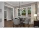 A cozy dining area with modern lighting and a view of the outdoor scenery at 2841 Bettis Ct, Marietta, GA 30066