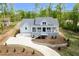 Charming two-story home featuring a welcoming front porch, gray siding, and an attached two car garage at 2841 Bettis Ct, Marietta, GA 30066