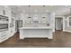 Modern kitchen with stainless steel appliances, white cabinets, and a large center island at 2841 Bettis Ct, Marietta, GA 30066
