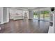 Open concept living room adjacent to the kitchen, featuring a large window and backyard access at 2841 Bettis Ct, Marietta, GA 30066