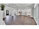 Open concept living room adjacent to the kitchen, featuring a large window and front door access at 2841 Bettis Ct, Marietta, GA 30066