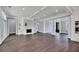 Spacious living room showcasing a fireplace, built-in shelving, coffered ceilings and large windows at 2841 Bettis Ct, Marietta, GA 30066