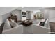 Inviting living room with sleek fireplace, hardwood floors and stylish furniture at 2841 Bettis Ct, Marietta, GA 30066
