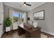 Office with desk, decor, natural light, and dark hardwood floors at 2841 Bettis Ct, Marietta, GA 30066