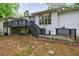 Wooden back deck offering tranquil views of mature trees and foliage at 3803 Butternut Dr, Decatur, GA 30034