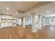 Spacious basement with kitchenette, including a sink, cabinets, and white appliances at 3803 Butternut Dr, Decatur, GA 30034