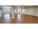 Expansive basement space with wood-look flooring and natural light from a large window at 3803 Butternut Dr, Decatur, GA 30034