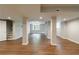 Finished basement featuring wood-look flooring, support columns, and a ceiling fan at 3803 Butternut Dr, Decatur, GA 30034