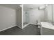 Basement bathroom featuring a modern vanity and a frameless glass shower at 3803 Butternut Dr, Decatur, GA 30034