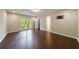 Spacious bedroom with two windows, wood floors, and neutral walls offering abundant natural light at 3803 Butternut Dr, Decatur, GA 30034