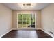 Bright dining area with large picture window offering stunning views of the surrounding greenery at 3803 Butternut Dr, Decatur, GA 30034