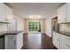 Bright kitchen with stainless steel appliances, granite countertops and views to the greenery outside at 3803 Butternut Dr, Decatur, GA 30034