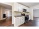 Bright, updated kitchen with stainless steel appliances and modern granite countertops at 3803 Butternut Dr, Decatur, GA 30034