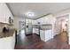 Modern kitchen featuring white cabinets, granite countertops, and stainless steel appliances at 3803 Butternut Dr, Decatur, GA 30034