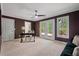 The bedroom has neutral carpet and a ceiling fan, with a patio door to the backyard at 404 Wade Creek Rd, Alpharetta, GA 30009