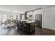 Bright, modern kitchen with stainless steel appliances, white cabinets, and a center island with bar seating at 404 Wade Creek Rd, Alpharetta, GA 30009