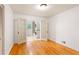 Bedroom boasts hardwood floors, double doors to laundry, and a closet for ample storage at 975 Shirley Se St, Smyrna, GA 30082