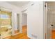 Hallway showcasing bathroom with a bathtub and ceramic tile at 975 Shirley Se St, Smyrna, GA 30082