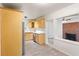 Modern kitchen features stainless steel appliances, wood cabinets, and a decorative view into dining area at 975 Shirley Se St, Smyrna, GA 30082