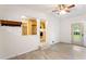 Open living room with view to kitchen and exterior door at 975 Shirley Se St, Smyrna, GA 30082