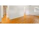 Cozy living room with gleaming hardwood floors and freshly painted walls at 975 Shirley Se St, Smyrna, GA 30082