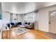Bright living room featuring hardwood floors, neutral paint, and stylish furnishings at 975 Shirley Se St, Smyrna, GA 30082