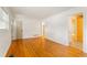 Bright living room featuring hardwood floors, fresh paint, and ample natural light at 975 Shirley Se St, Smyrna, GA 30082