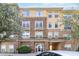 Exterior shot of the building featuring stone and siding facade with landscaped grounds at 10 Ne Perimeter Summit Ne Blvd # 4428, Brookhaven, GA 30319