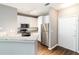 Modern kitchen featuring white cabinets, stainless steel appliances, and granite countertops at 10 Ne Perimeter Summit Ne Blvd # 4428, Brookhaven, GA 30319