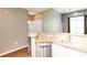 Bright kitchen featuring granite counters, stainless appliances, and hardwood flooring at 10 Ne Perimeter Summit Ne Blvd # 4428, Brookhaven, GA 30319