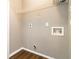 A functional laundry room with hookups and shelving for efficient organization at 10 Ne Perimeter Summit Ne Blvd # 4428, Brookhaven, GA 30319