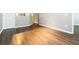 Open living room featuring beautiful hardwood floors and ample natural light at 10 Ne Perimeter Summit Ne Blvd # 4428, Brookhaven, GA 30319
