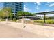 Perimeter Summit signage with water feature near high rise office and greenspace with shade coverings at 10 Ne Perimeter Summit Ne Blvd # 4428, Brookhaven, GA 30319