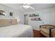 Charming bedroom with hardwood floors, a seating area, and ample natural light from the windows at 1788 Beacon Hill Ne Blvd, Atlanta, GA 30329