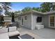 Expansive deck with a TV, outdoor cooking area, and comfortable lounge furniture at 1788 Beacon Hill Ne Blvd, Atlanta, GA 30329