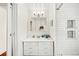Bright bathroom features updated vanity with great storage, subway tile shower, and stylish design at 1961 Addison Ne Rd, Marietta, GA 30066