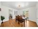 Dining room features hardwood floors, space for four, and sliding doors to the exterior at 1961 Addison Ne Rd, Marietta, GA 30066