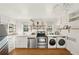 Stylish kitchen boasts stainless steel appliances, white cabinets, and butcher block countertops at 1961 Addison Ne Rd, Marietta, GA 30066